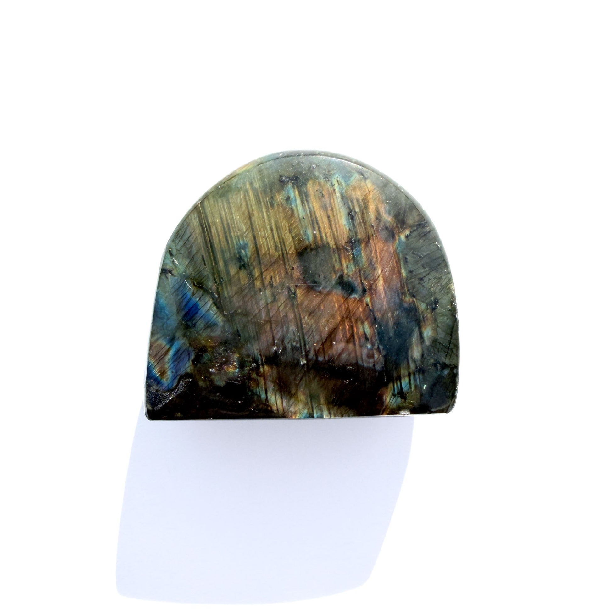 labradorite freeform crystal freeform with flash, on a white background with light shadow.